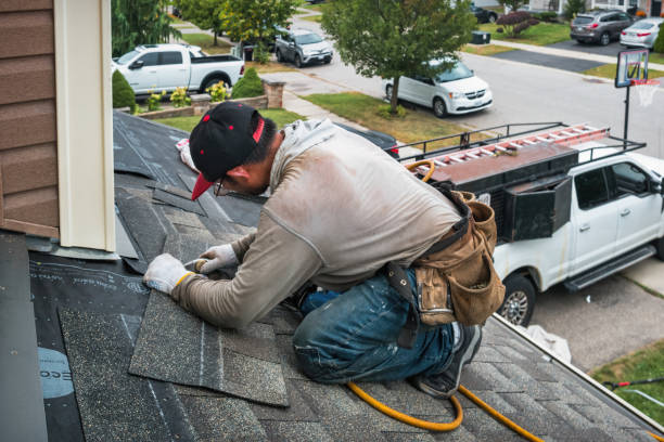 Professional Roofing technician working in Delia, KS